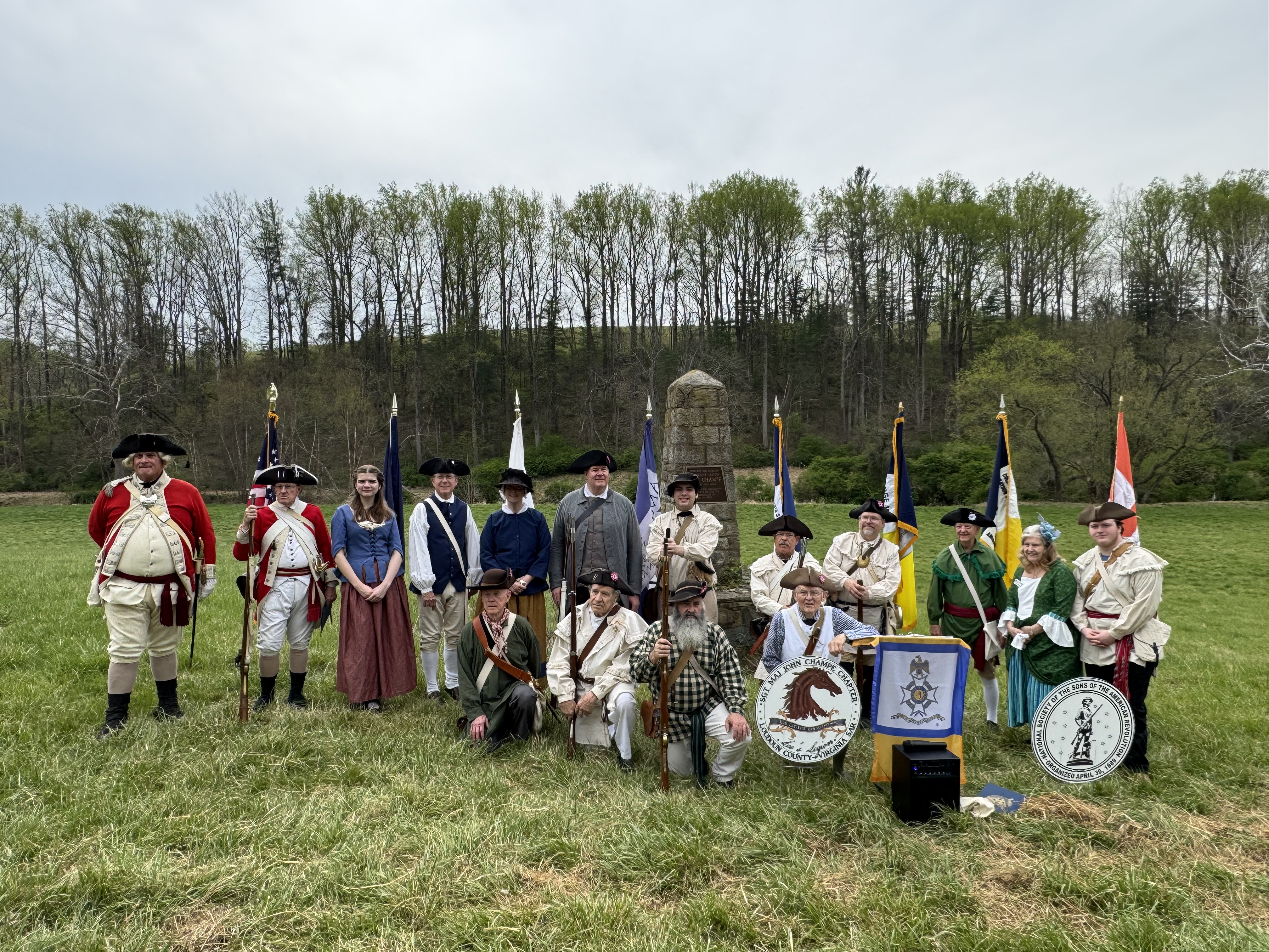Group photo of SAR, SAR and British troop reenactors as participants dressed in colonial attire for the the ceremonies of the day.