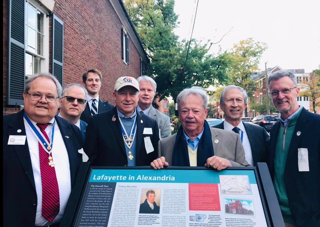 Virginia SAR members pose for photo around Lafayette in Alexandria heritage trail marker.